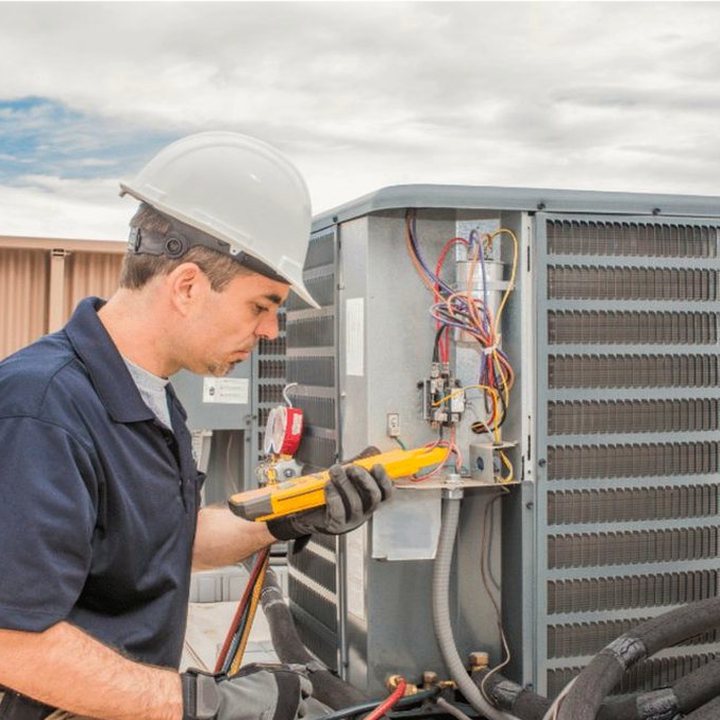 Wiarton Heating & Cooling HVAC technician on a service call in Wiarton, Ontario
